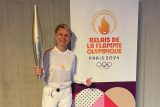 Běžkyně Lenka Henebergová se jako jediná Češka zapojila do olympijské štafety ve Francii